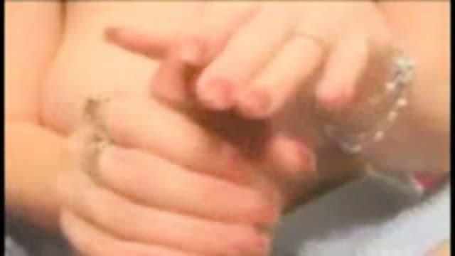 Big titted chick giving a handjob